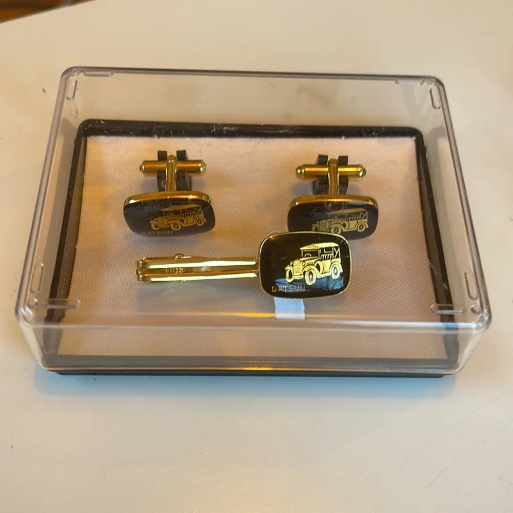 Vintage Datsun cuff links and tie clip